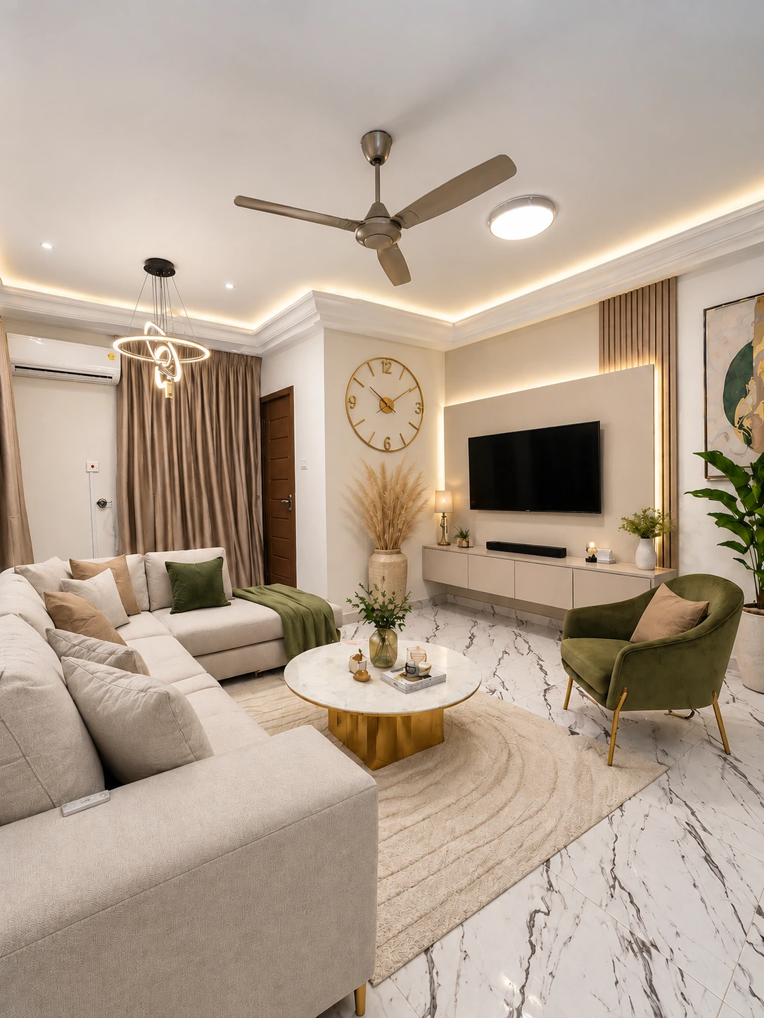 Living room with upholstered seating, decorative wall finishes and fitted lighting